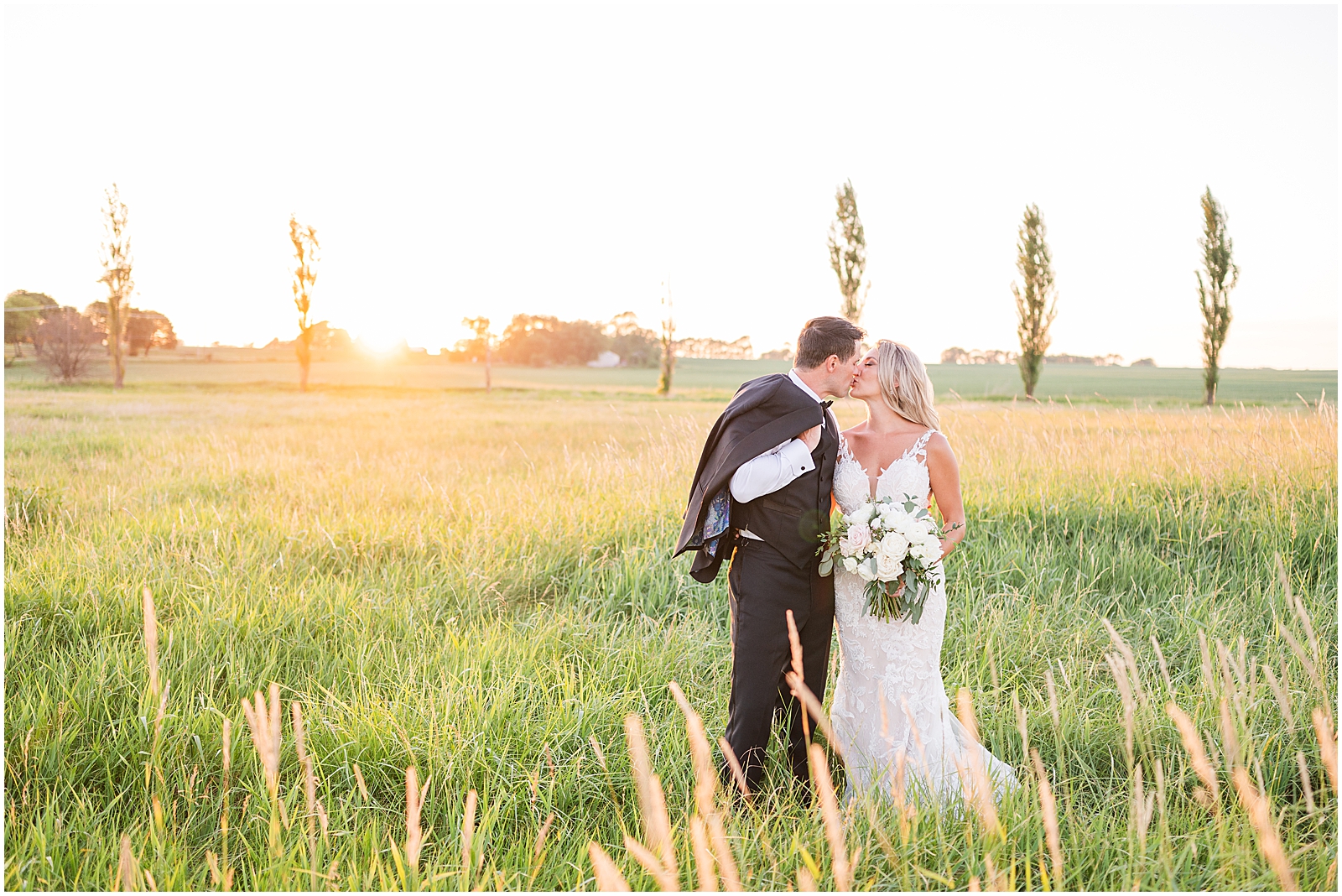 Sunset wedding portraits at Providence Vineyard in Hebron, IL