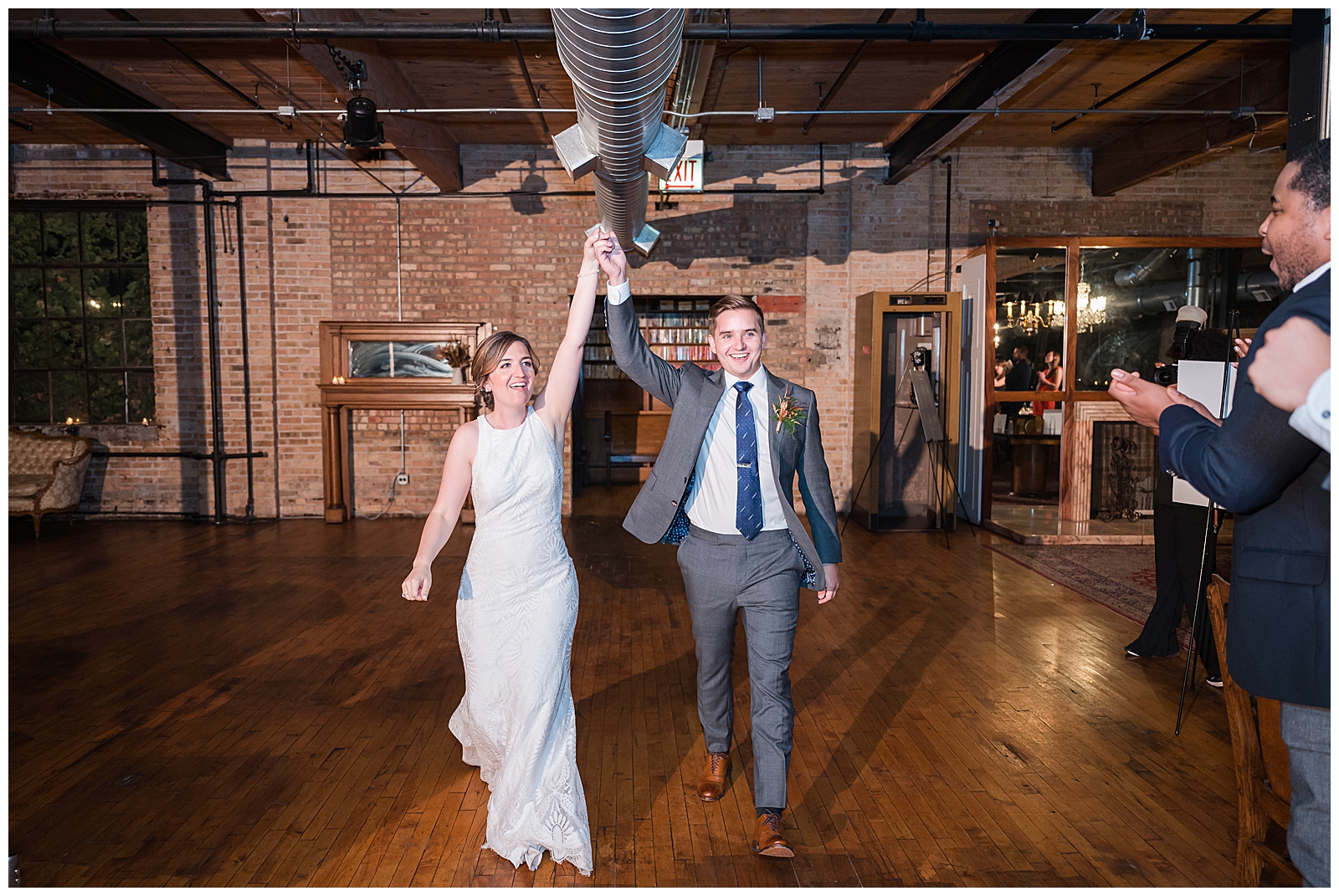 Bride and groom make their entrance at Salvage One 