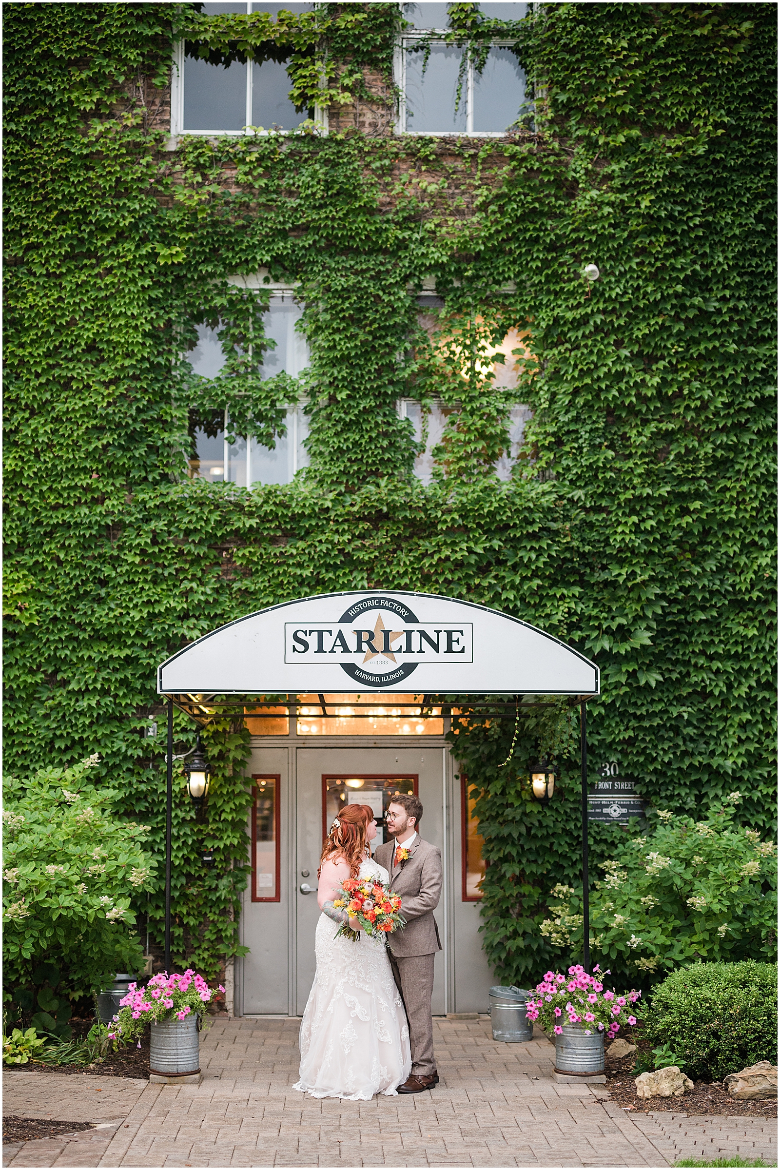 Couple portrait outside The Starline Factory showing off the Ivy backdrop.