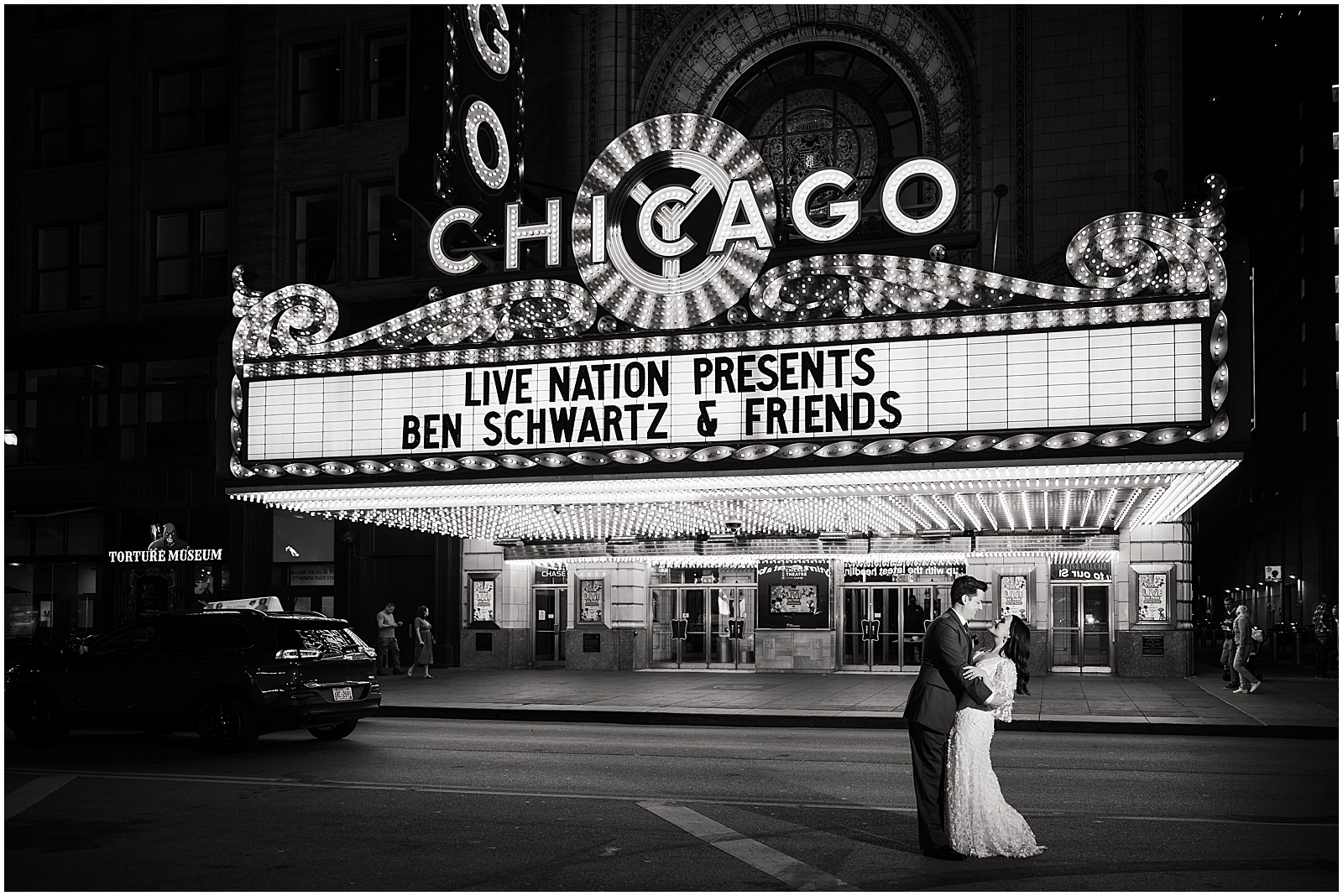 Black and White wedding portrait outside The Chicago Theater