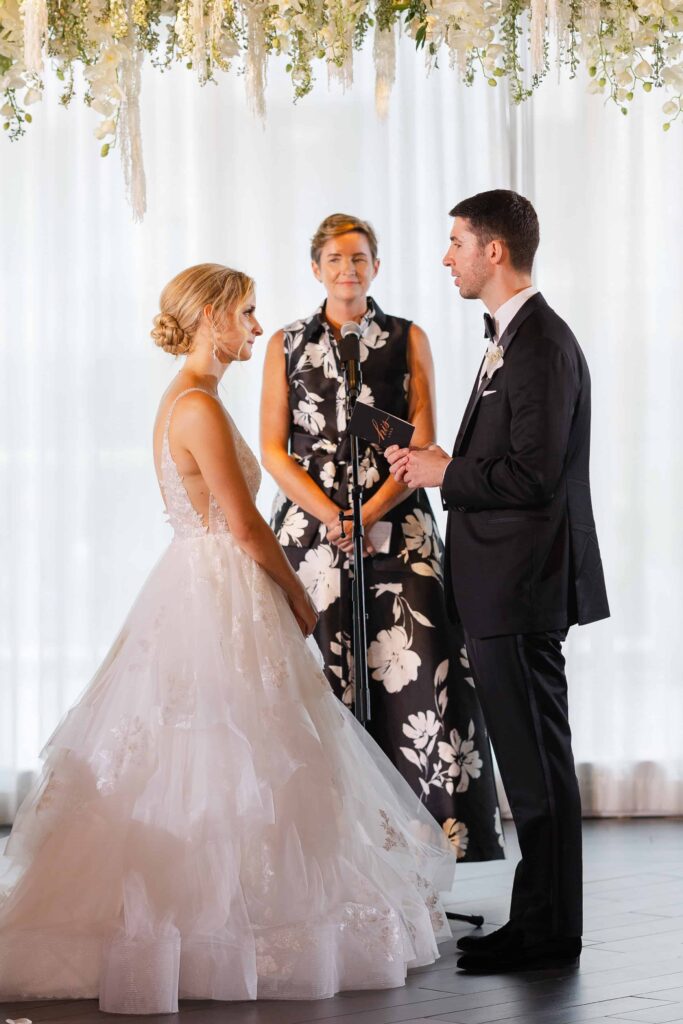 RPM Events Chicago wedding ceremony with floor-to-ceiling windows.